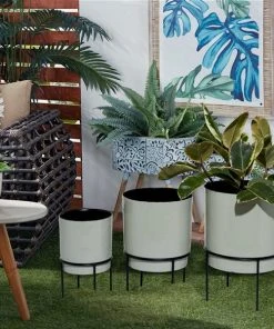 Grayson Lane 6.88-in x 10-in White Metal Planters - Set of 3 7 Grayson Lane 6.88-in x 10-in White Metal Planters - Set of 3 -GRAYSON LANE shop 330940958 AlternateImage2 l